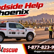 Dugger's Road Rescue truck helping a driver on a Phoenix freeway shoulder
